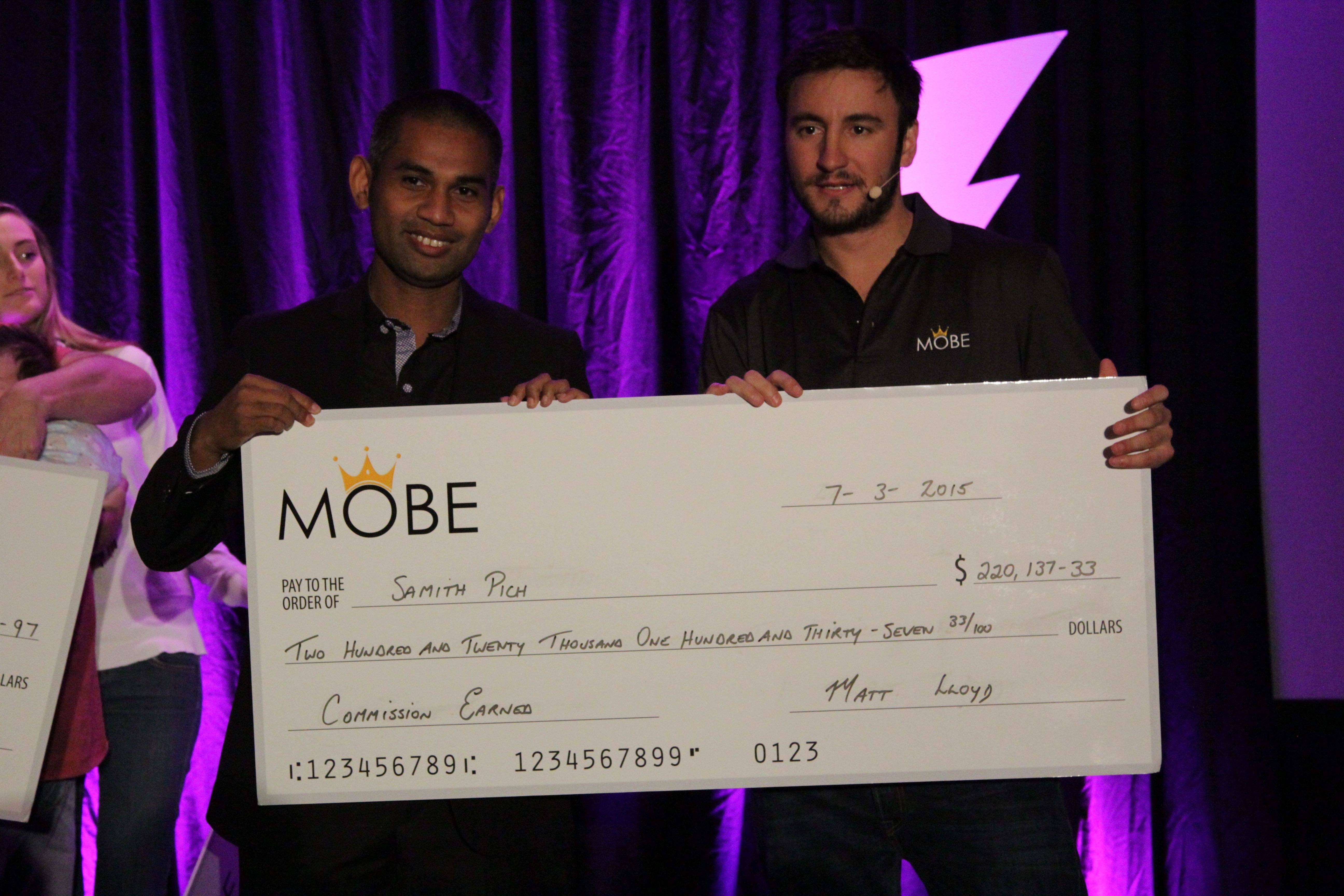 Accepting a cheque for $220k on Stage...